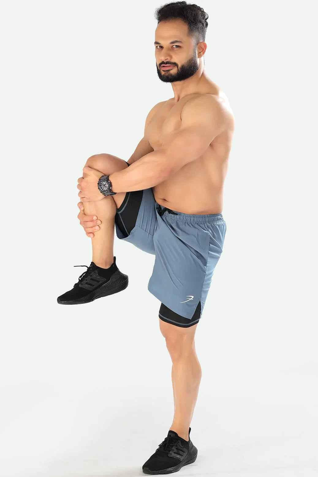 Light grey 2-in-1 compression shorts by Fuaark Nz featuring a snug fit and athletic design for active wear.