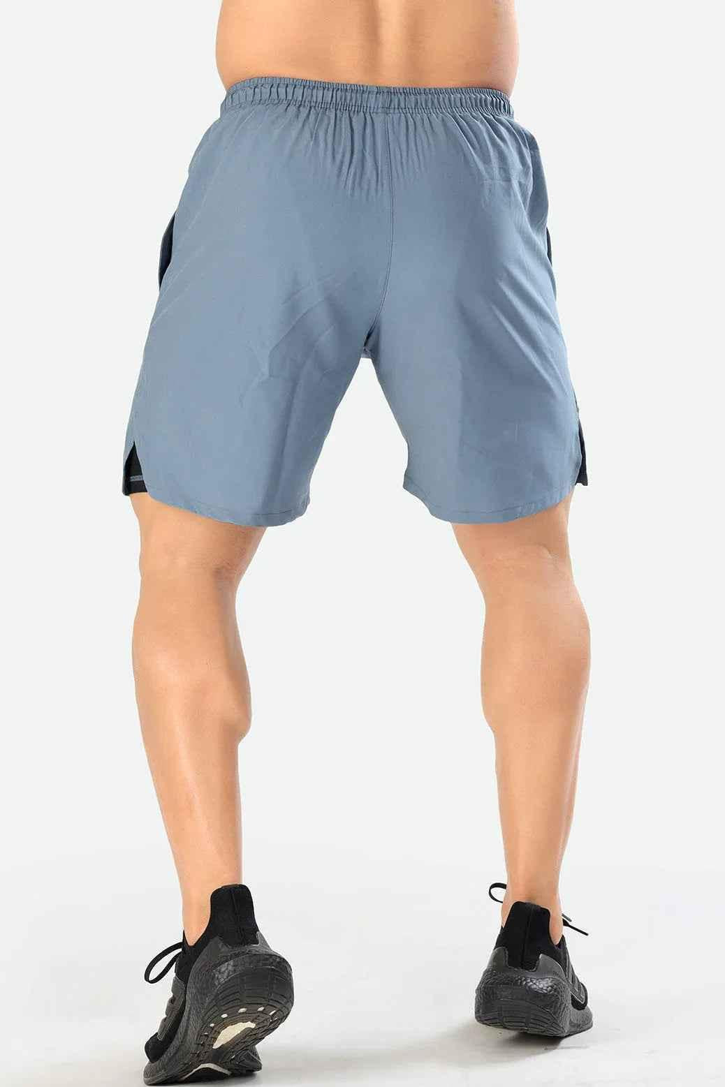 Fuaark Nz 2-in-1 compression shorts in light grey, athletic shorts with supportive fit and moisture-wicking fabric for active wear.