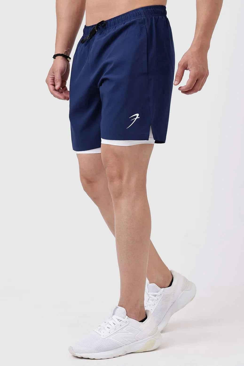 Navy 2-in-1 compression shorts by Fuaark Nz, featuring a snug fit and stretchy fabric for active wear and support.