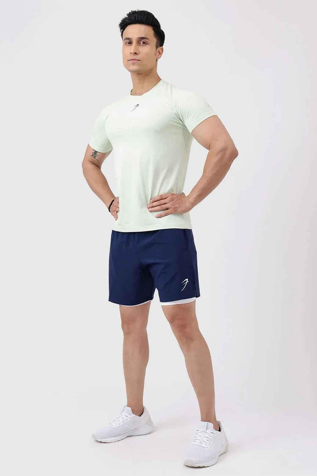 Navy 2-in-1 compression shorts by Fuaark Nz, designed for athletic support and comfort with a sleek fit.