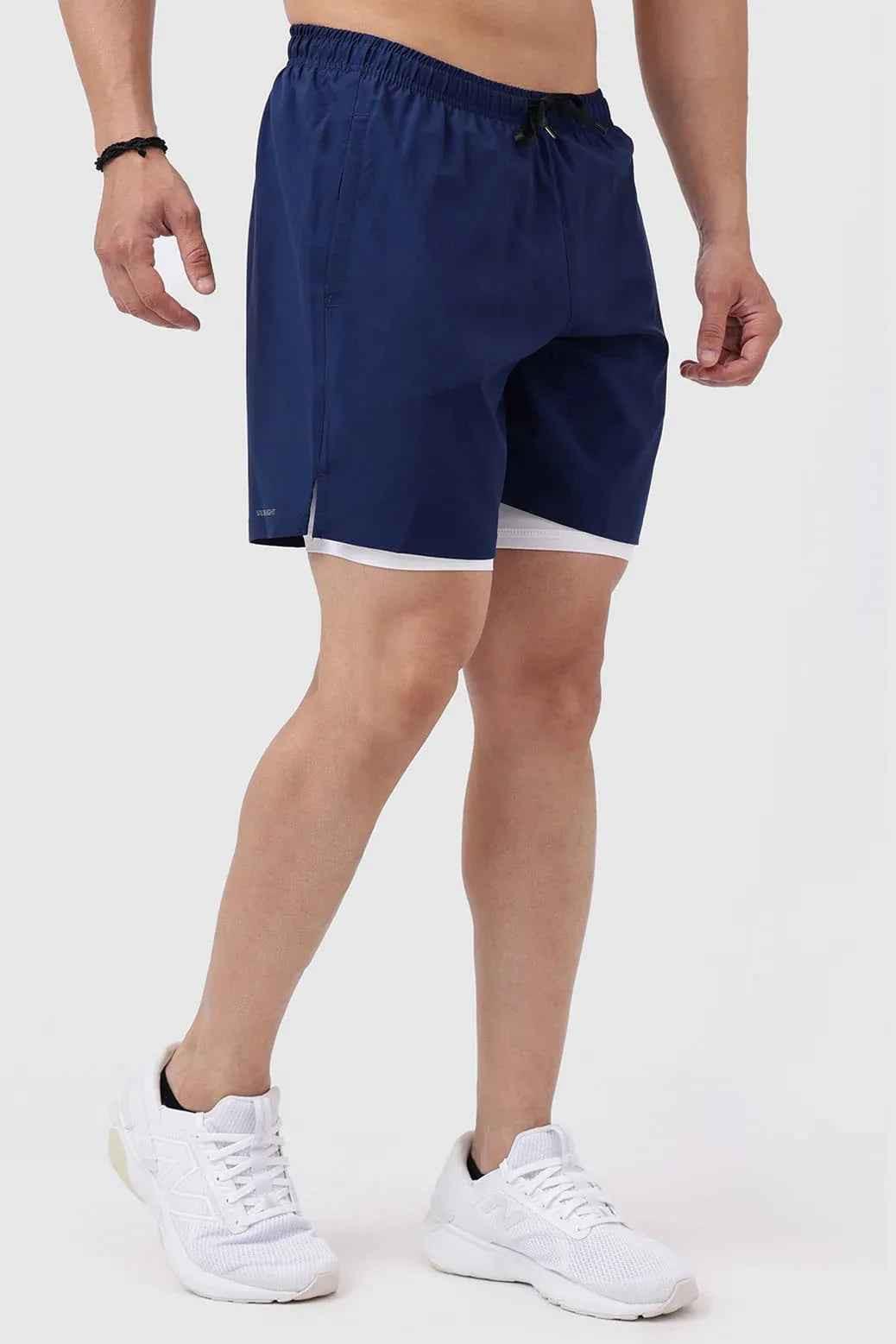 Navy 2-in-1 compression shorts by Fuaark Nz, featuring a stretchy, supportive design for athletic activities.