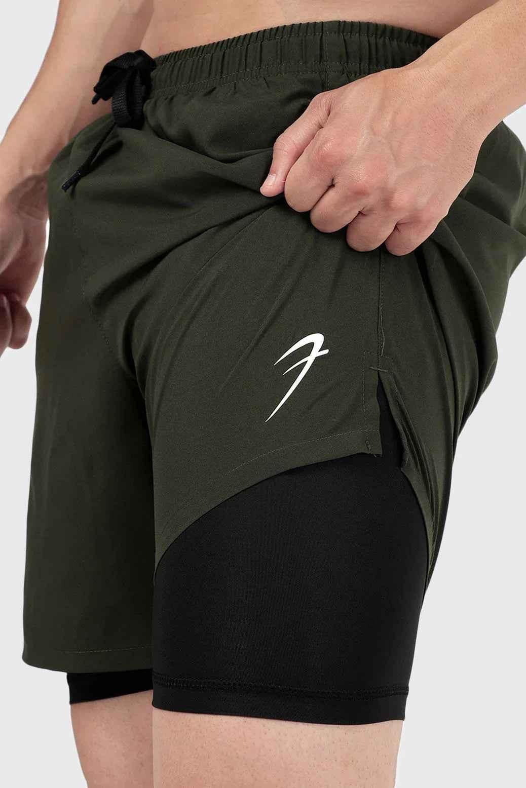 Fuaark Nz 2-in-1 compression shorts in olive color, designed for comfort and performance, featuring a sleek athletic fit.