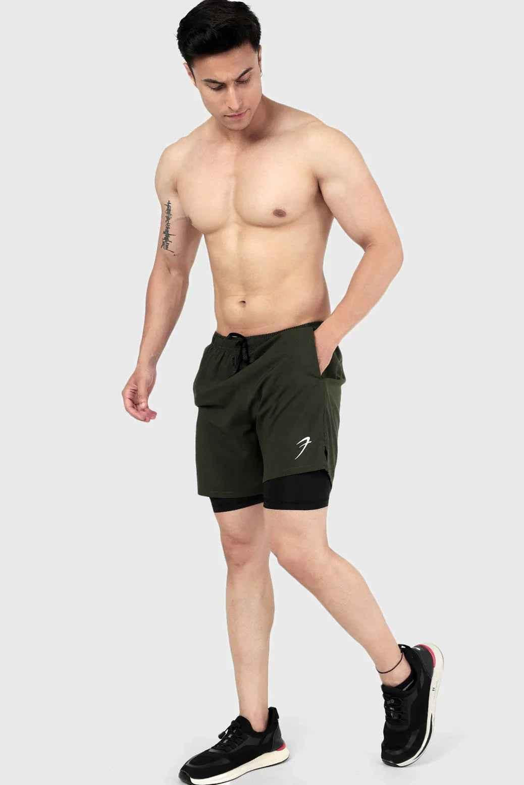 Fuaark Nz 2-in-1 olive compression shorts for men, designed for comfort and performance during workouts.