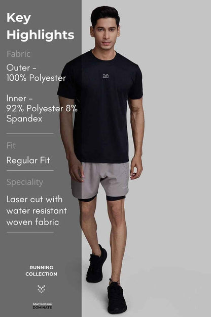 Fuaark NZ 2-in-1 laser shorts in beige with black accents, featuring a stylish, versatile design for active wear or casual outfits.