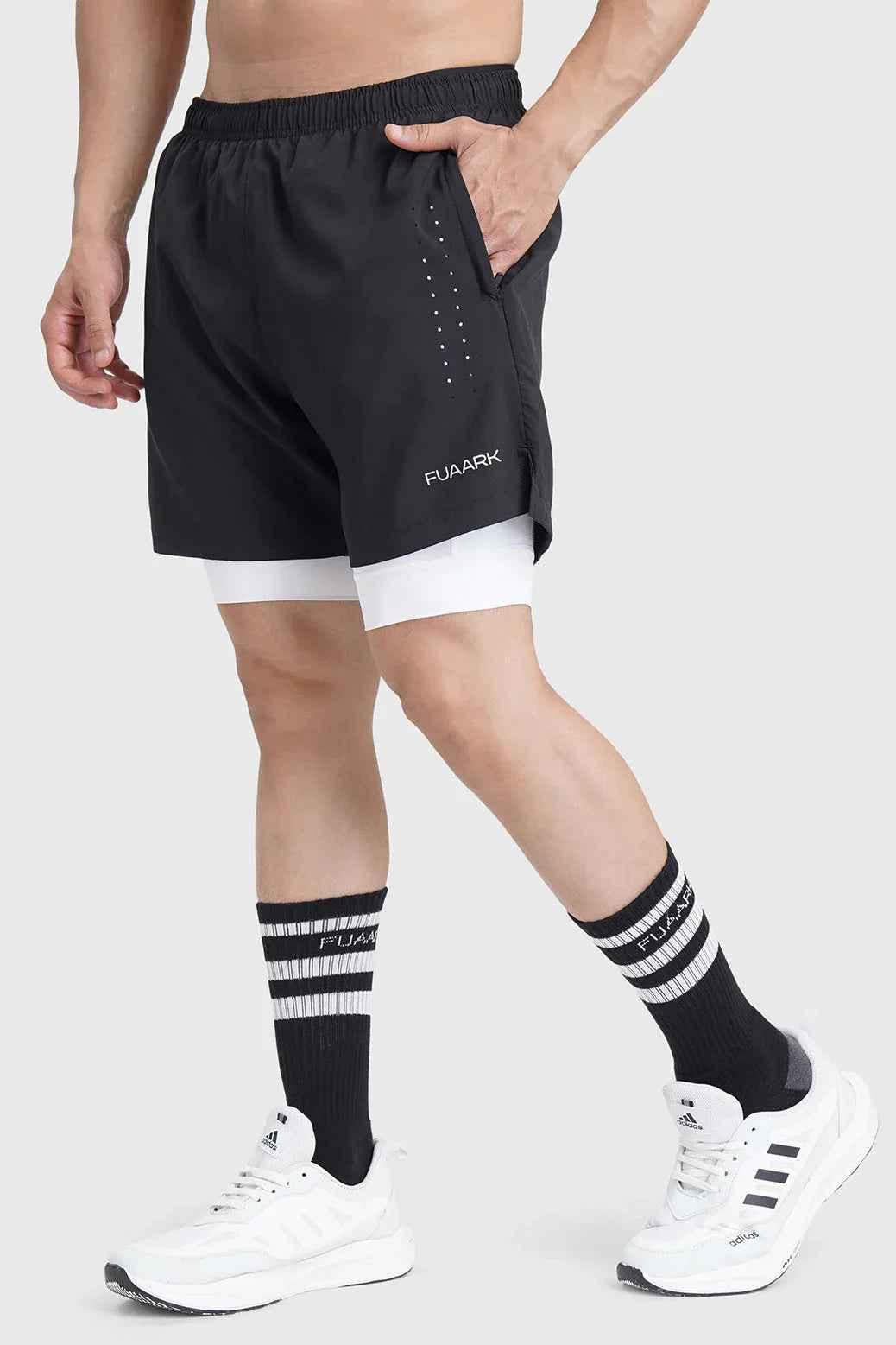 Black 2-in-1 Laser Shorts by Fuaark Nz, stylish versatile activewear shorts showing the sleek design and comfortable fit