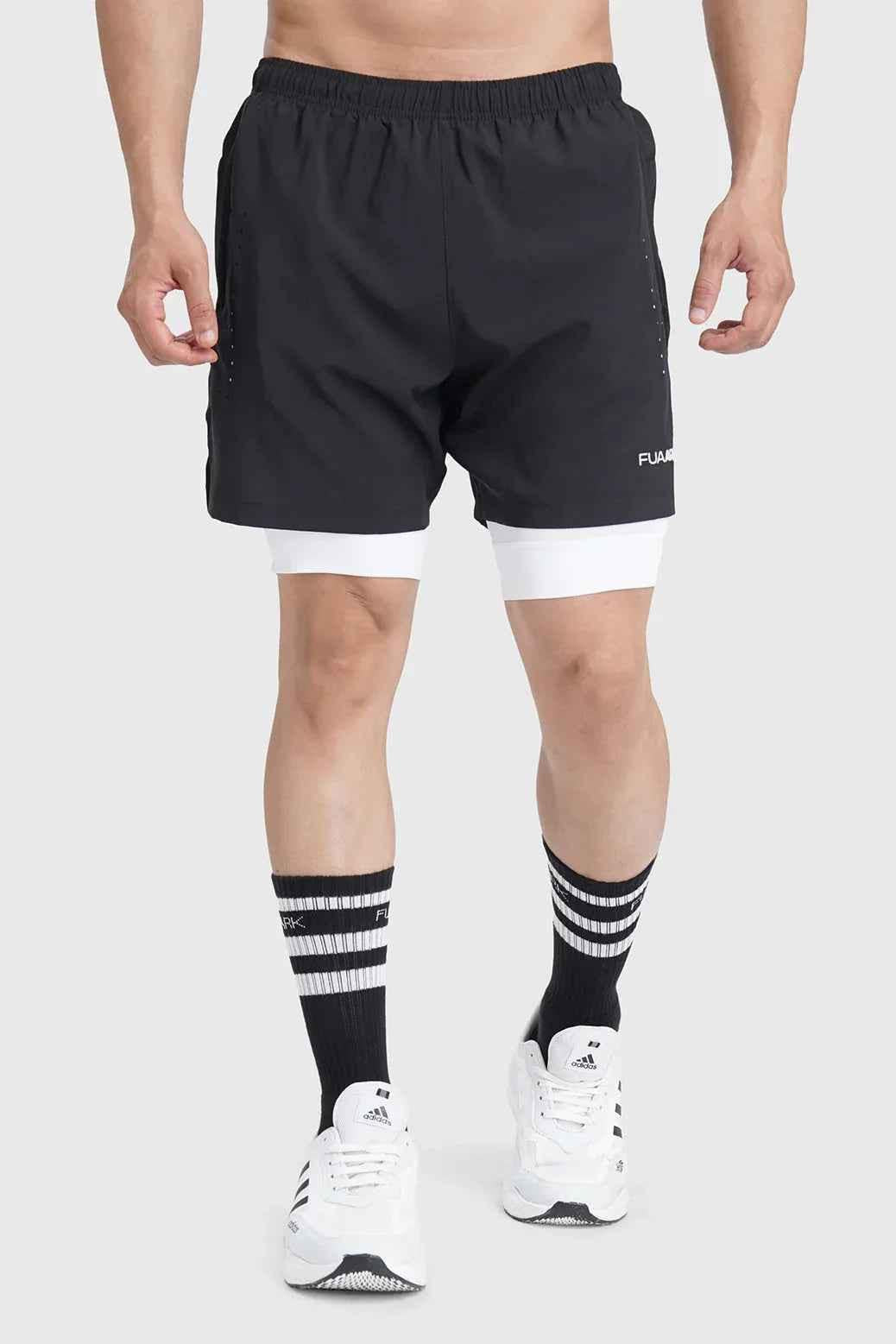 Black 2-in-1 laser shorts by Fuaark NZ, stylish and versatile activewear shorts with modern design for active lifestyles.