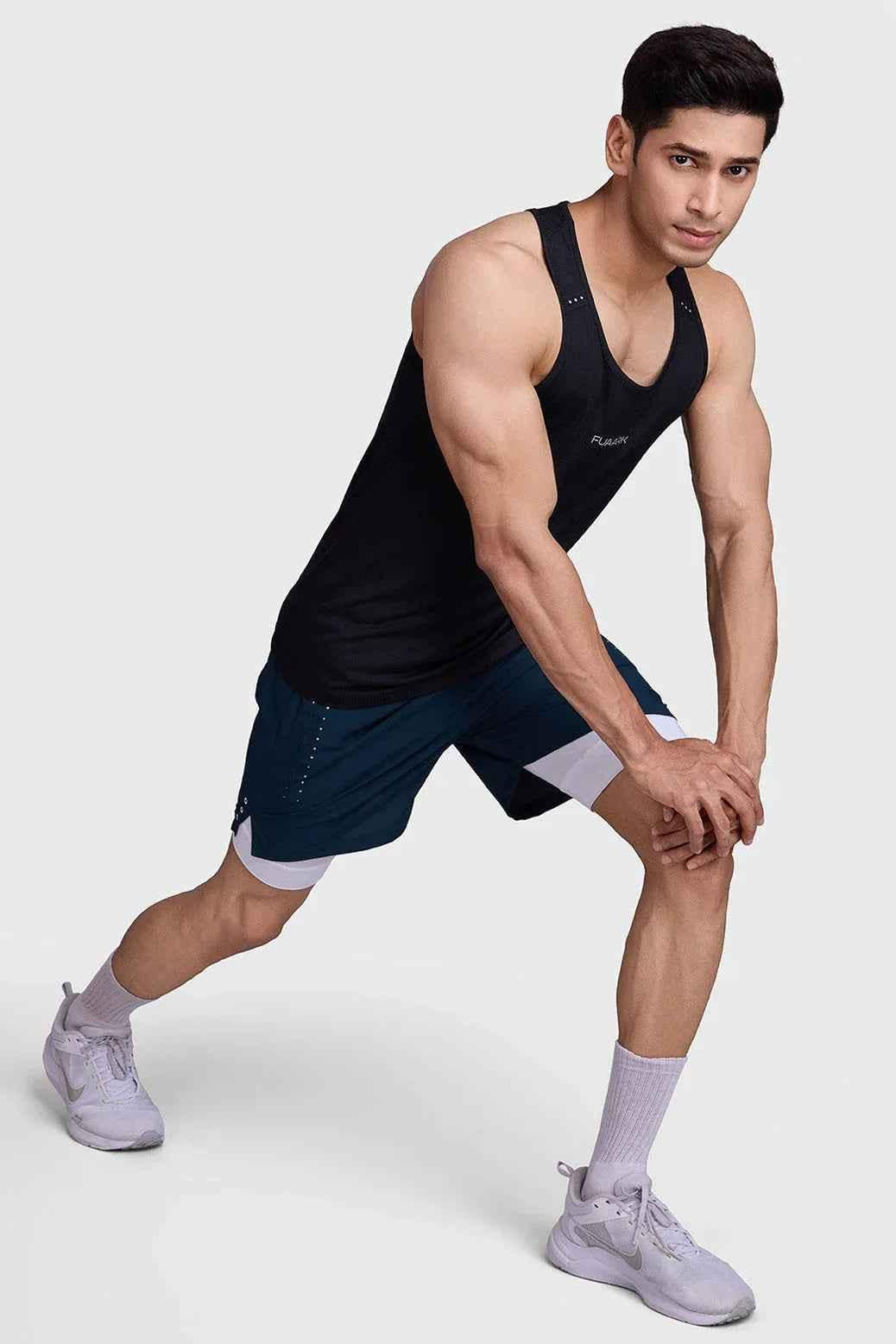 Fuaark Nz 2-in-1 Laser Shorts in pine green, stylish athletic shorts with a modern design and comfortable fit.