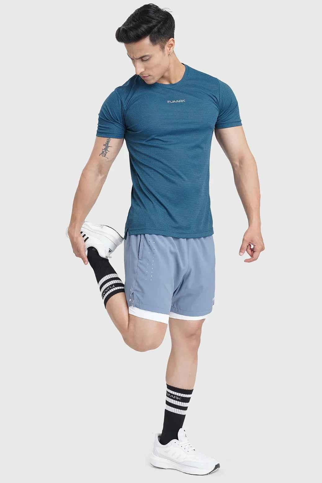 Fuaark Nz 2 in 1 Laser Shorts in raw steel fabric, featuring a sleek, modern design with a laser-cut detail and comfortable fit.