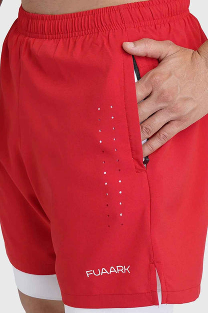 Red 2 in 1 Laser Shorts by Fuaark Nz featuring stylish, comfortable shorts with laser detailing for active wear.