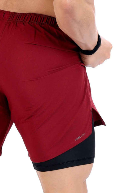 Fuaark Nz 2-in-1 maroon compression shorts for men, designed for comfort and performance during workouts.