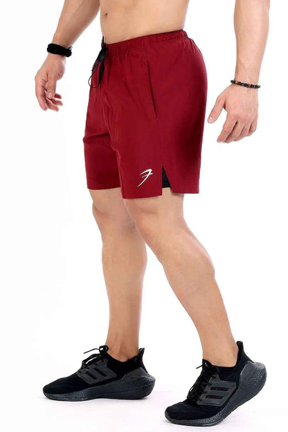 Fuaark Nz 2-in-1 maroon compression shorts designed for comfort and performance, featuring a snug fit and breathable fabric.
