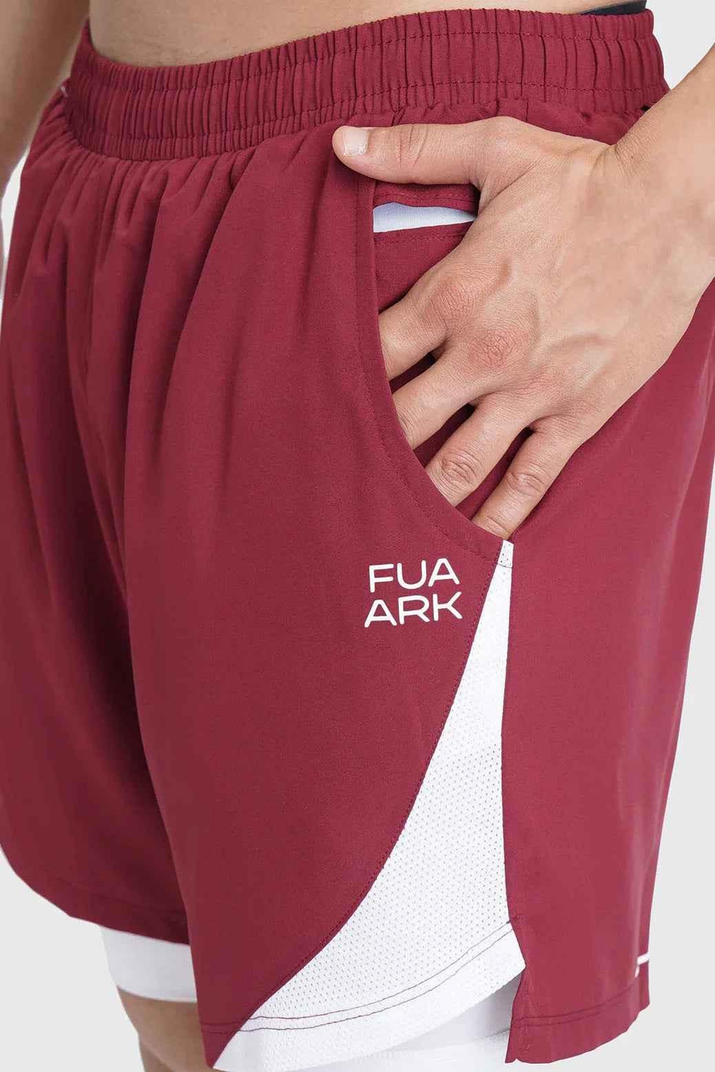 Fuaark Nz 2-in-1 maroon mesh shorts for men, showcasing comfortable, stylish design with breathable fabric and athletic fit.