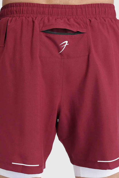 Fuaark Nz 2-in-1 maroon mesh shorts for men, featuring breathable fabric and stylish design for comfort and casual wear.