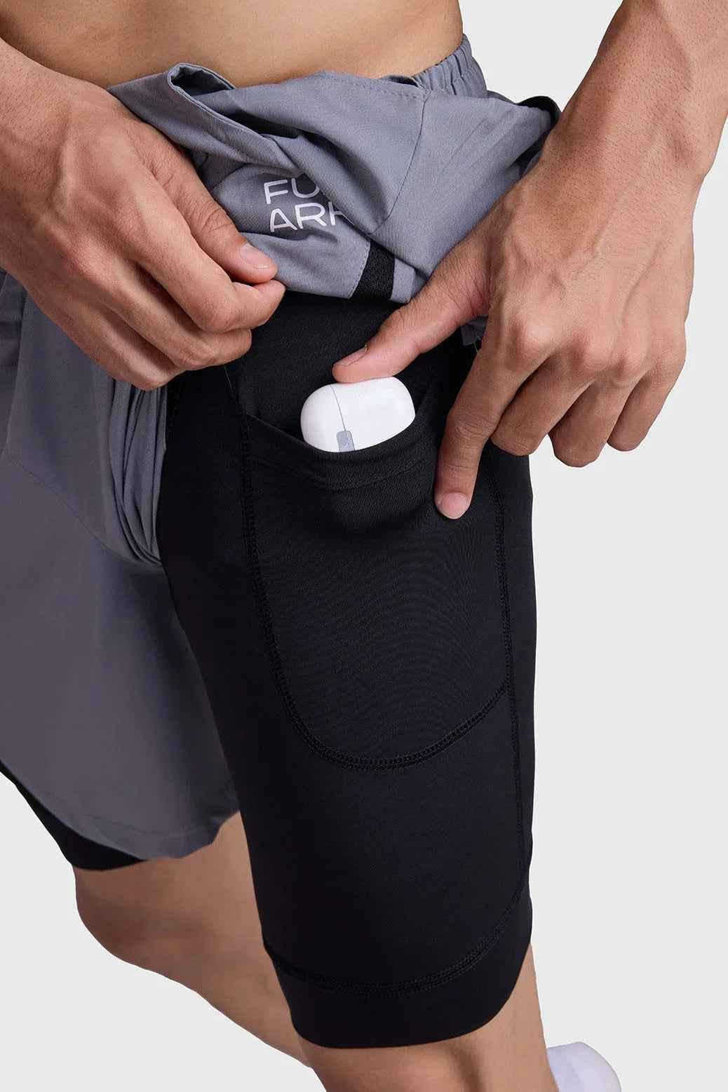 Fuaark Nz 2-in-1 mesh shorts in foggy grey with black accents, featuring a lightweight, breathable design for active wear.