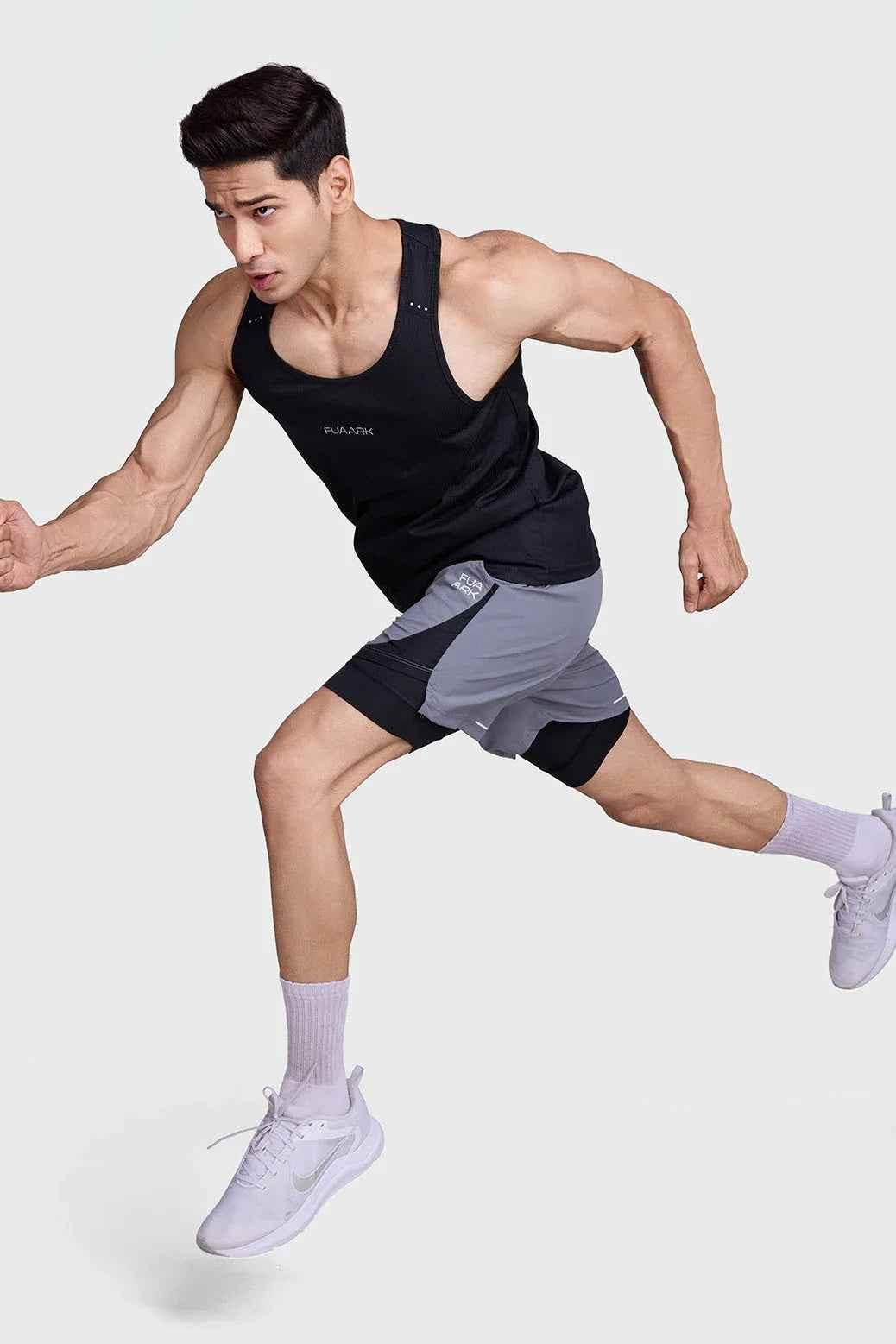 Fuaark Nz 2-in-1 mesh shorts in foggy grey with black accents, featuring breathable fabric and sporty design.