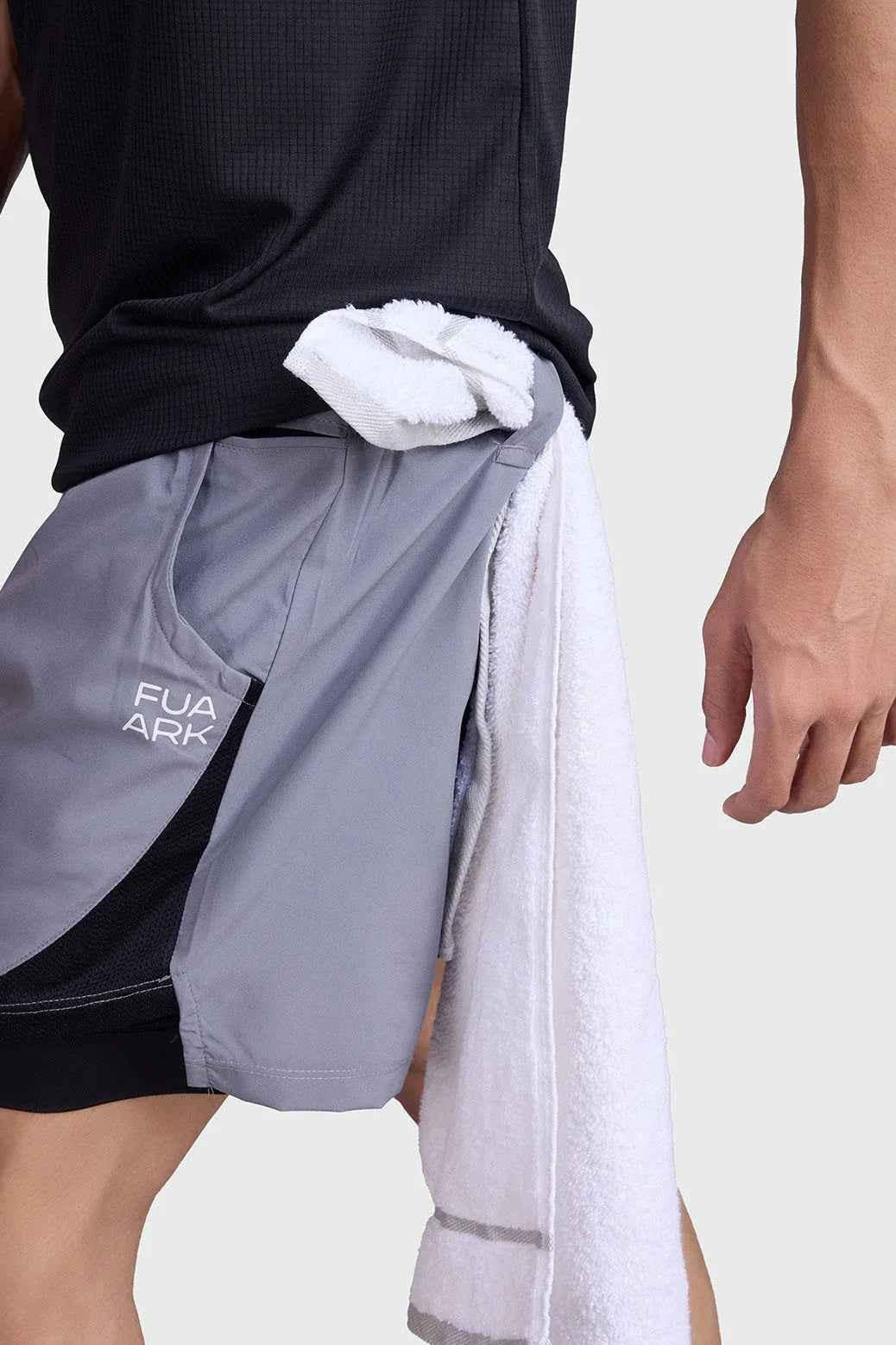 Fuaark NZ 2-in-1 mesh shorts in foggy grey with black accents, featuring breathable fabric and sporty design.