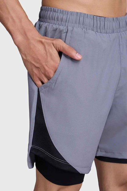 Fuaark NZ 2-in-1 mesh shorts in foggy grey with black accents, featuring a comfortable athletic design and breathable fabric.