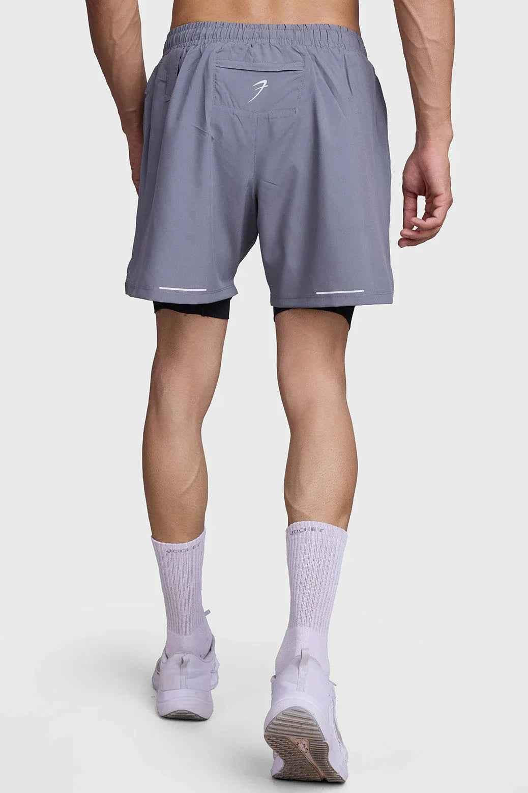 Fuaark NZ 2-in-1 mesh shorts in foggy grey with black accents, featuring breathable fabric and sporty design.