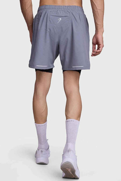 Fuaark NZ 2-in-1 mesh shorts in foggy grey with black accents, featuring breathable fabric and sporty design.