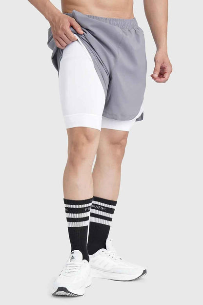 Fuaark NZ 2-in-1 mesh shorts in foggy grey with white accents, featuring lightweight breathable fabric and athletic fit.