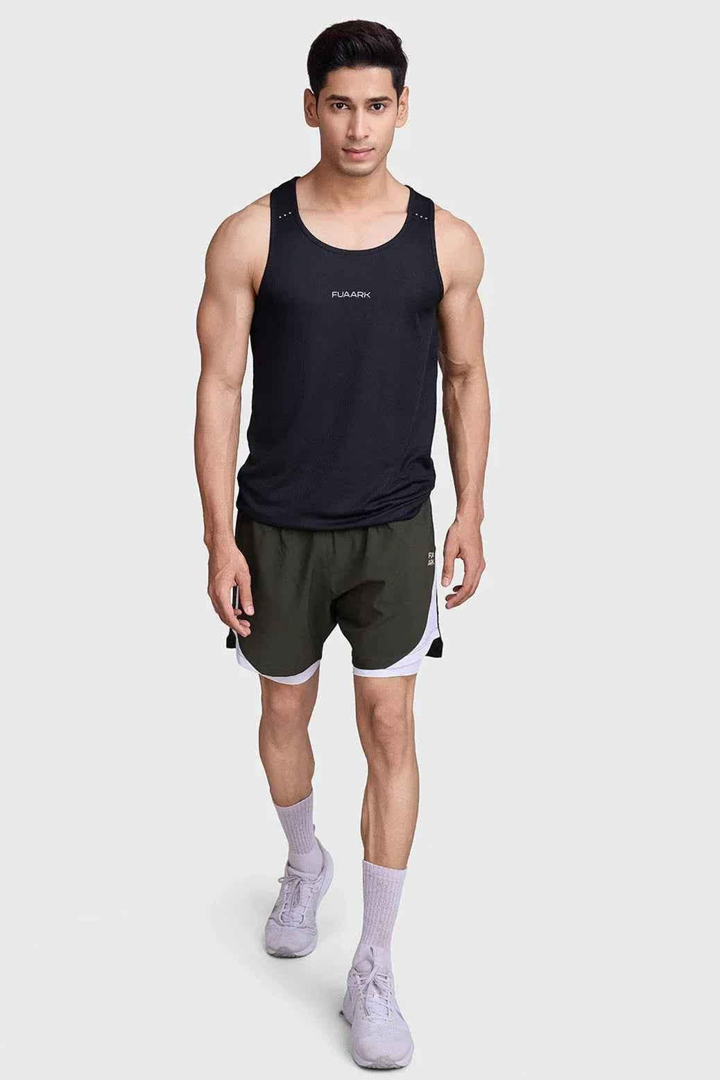 Olive green 2-in-1 mesh shorts by Fuaark Nz, featuring breathable fabric and sporty design for active wear.