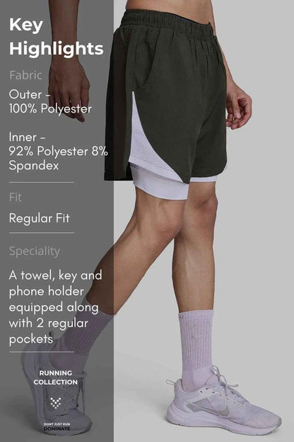 Olive green 2-in-1 mesh shorts by Fuaark Nz, featuring a comfortable athletic design with breathable fabric.