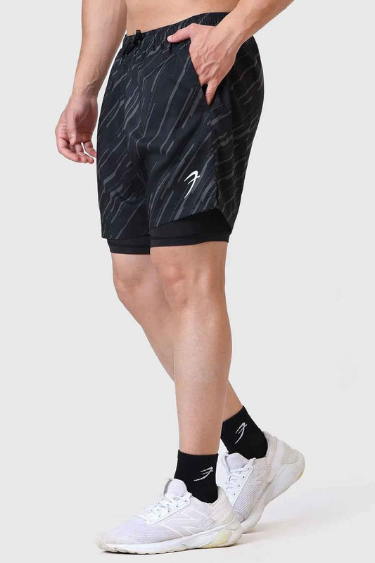Black 2 in 1 printed compression shorts by Fuaark Nz, featuring a sleek design and comfortable fit for active wear.