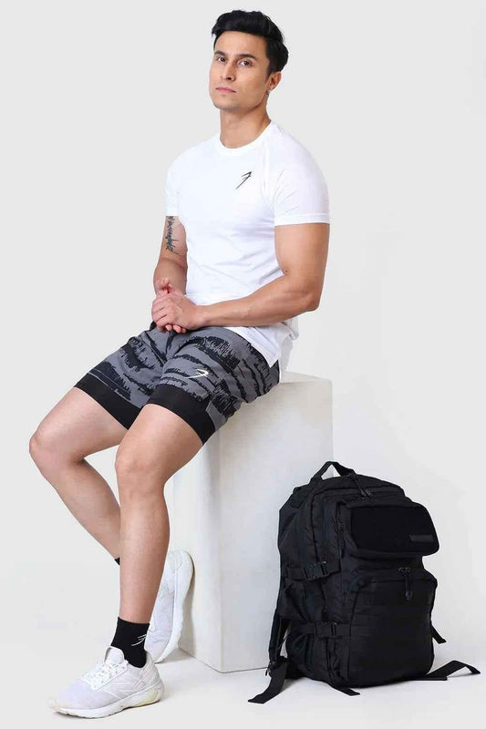Fuaark Nz 2-in-1 printed compression shorts in gold and grey, featuring a sleek design and comfortable fit for active wear.