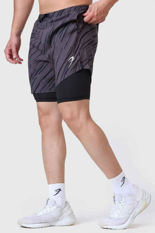 Fuaark Nz 2-in-1 printed compression shorts in graphite with colorful design, made for athletic performance and active wear.
