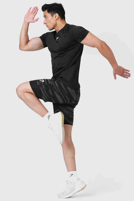 Fuaark Nz 2-in-1 printed compression shorts in olive color, featuring a sleek design and comfortable fit for active wear.
