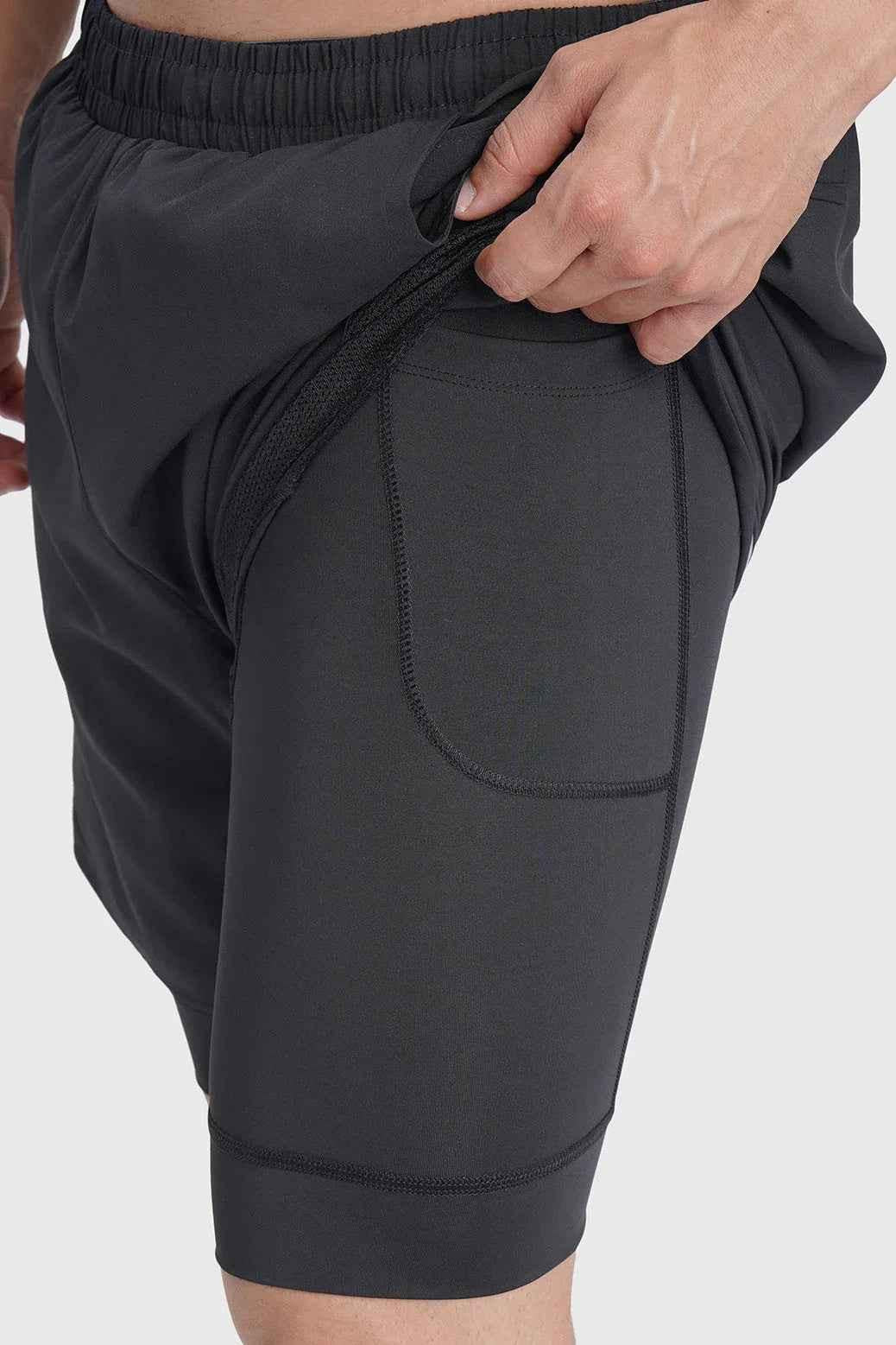 Black Fuaark NZ 2-in-1 mesh shorts with built-in support liner, designed for breathability and quick-dry performance.