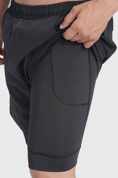 Black Fuaark NZ 2-in-1 mesh shorts with built-in support liner, designed for breathability and quick-dry performance.