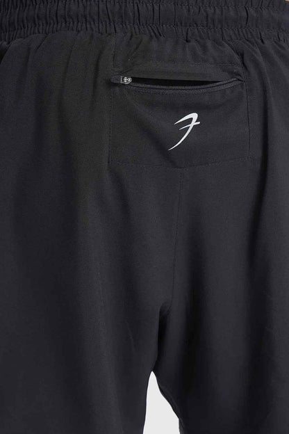 Black Fuaark Nz 2-in-1 mesh shorts with built-in support liner, designed for breathability and quick-dry performance.