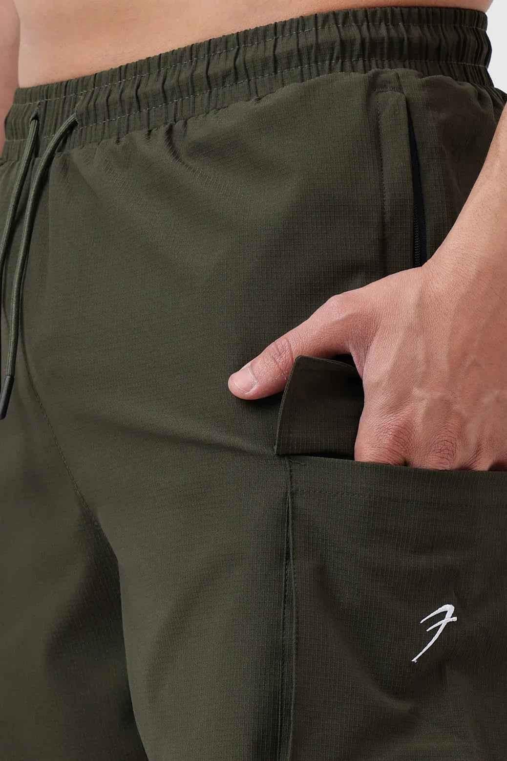 Fuaark Nz Delta Cargo Shorts in army green, featuring multiple pockets and a relaxed fit, casual summer men's shorts.