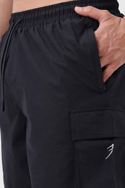 Black Delta Cargo Shorts by Fuaark NZ, casual men's shorts with multiple pockets and durable fabric, ideal for outdoor wear.
