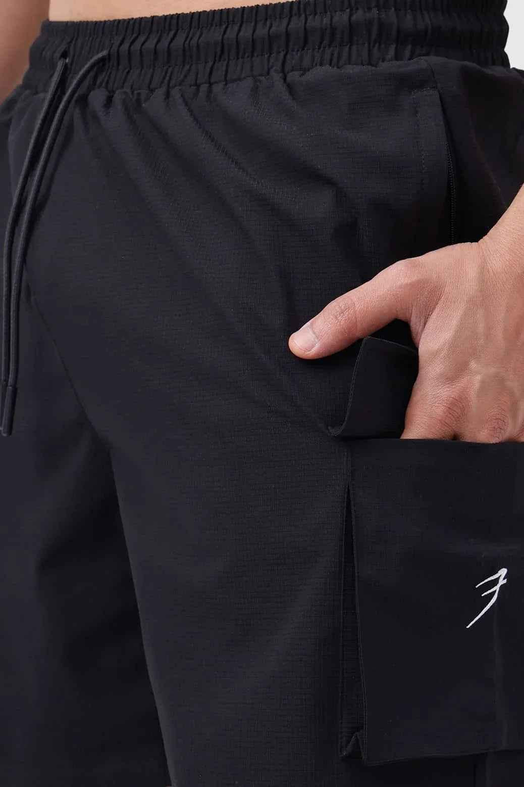 Black Delta Cargo Shorts by Fuaark Nz, casual men's shorts with multiple pockets, suitable for outdoor and everyday wear.