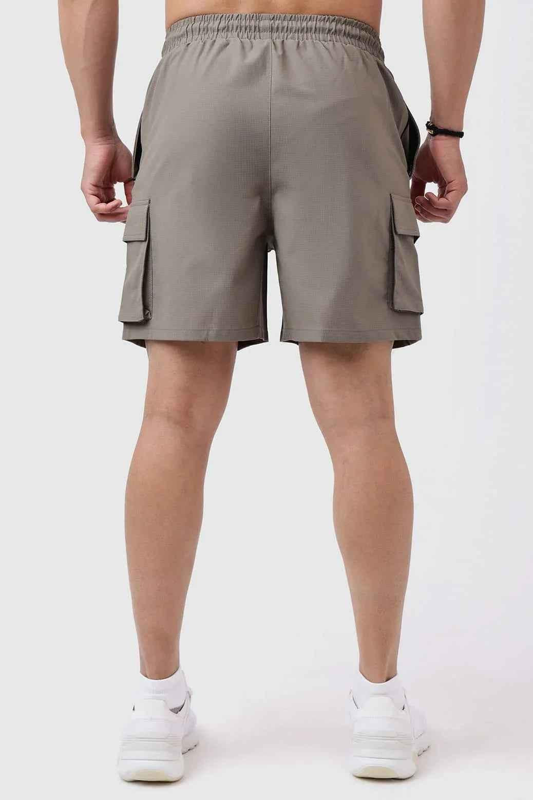 Fuaark Nz Delta Cargo Shorts in brown, casual men's shorts with multiple pockets and comfortable fit, ideal for outdoor wear.