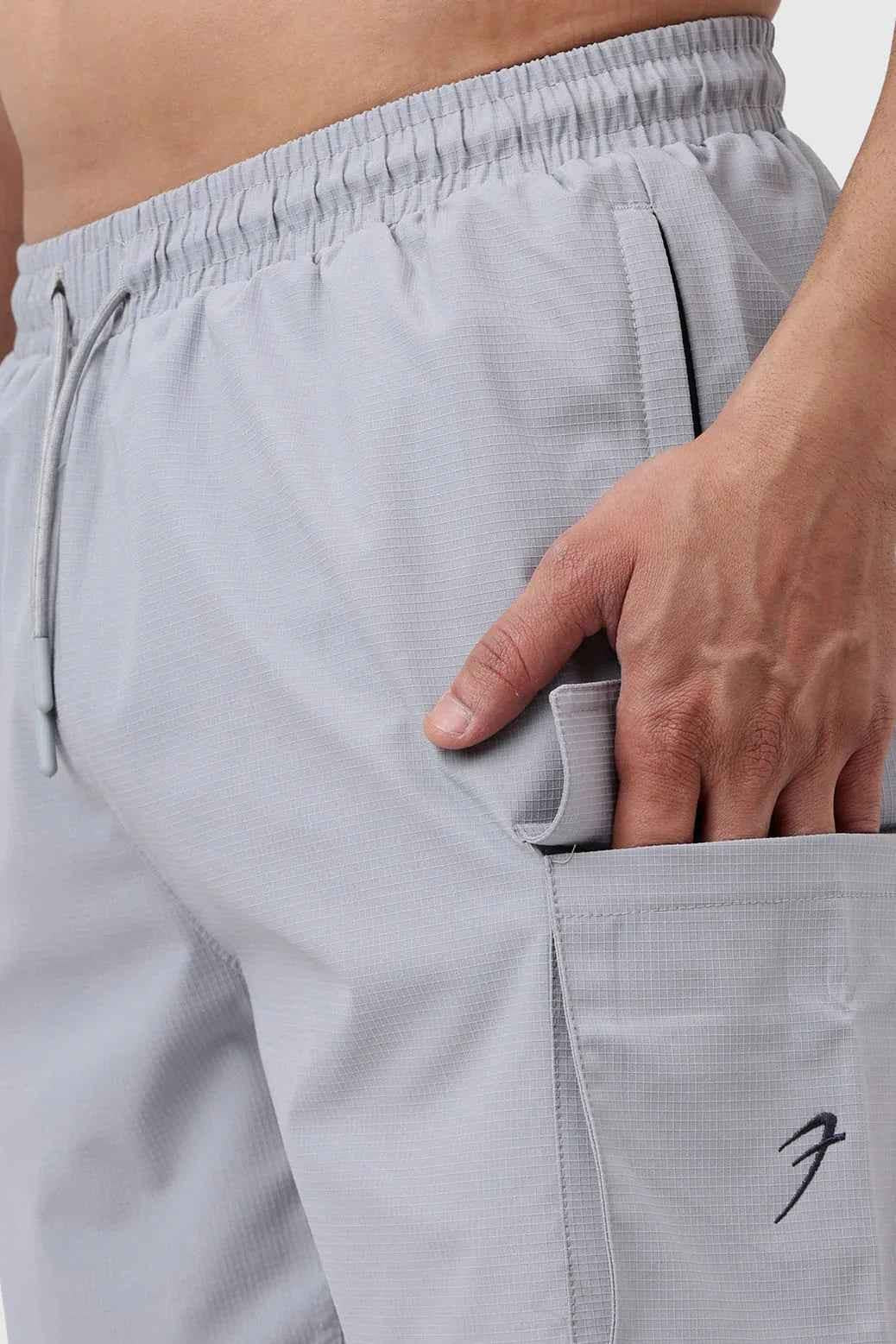 Light grey Delta Cargo Shorts by Fuaark NZ, featuring multiple pockets and a casual fit, suitable for everyday wear.
