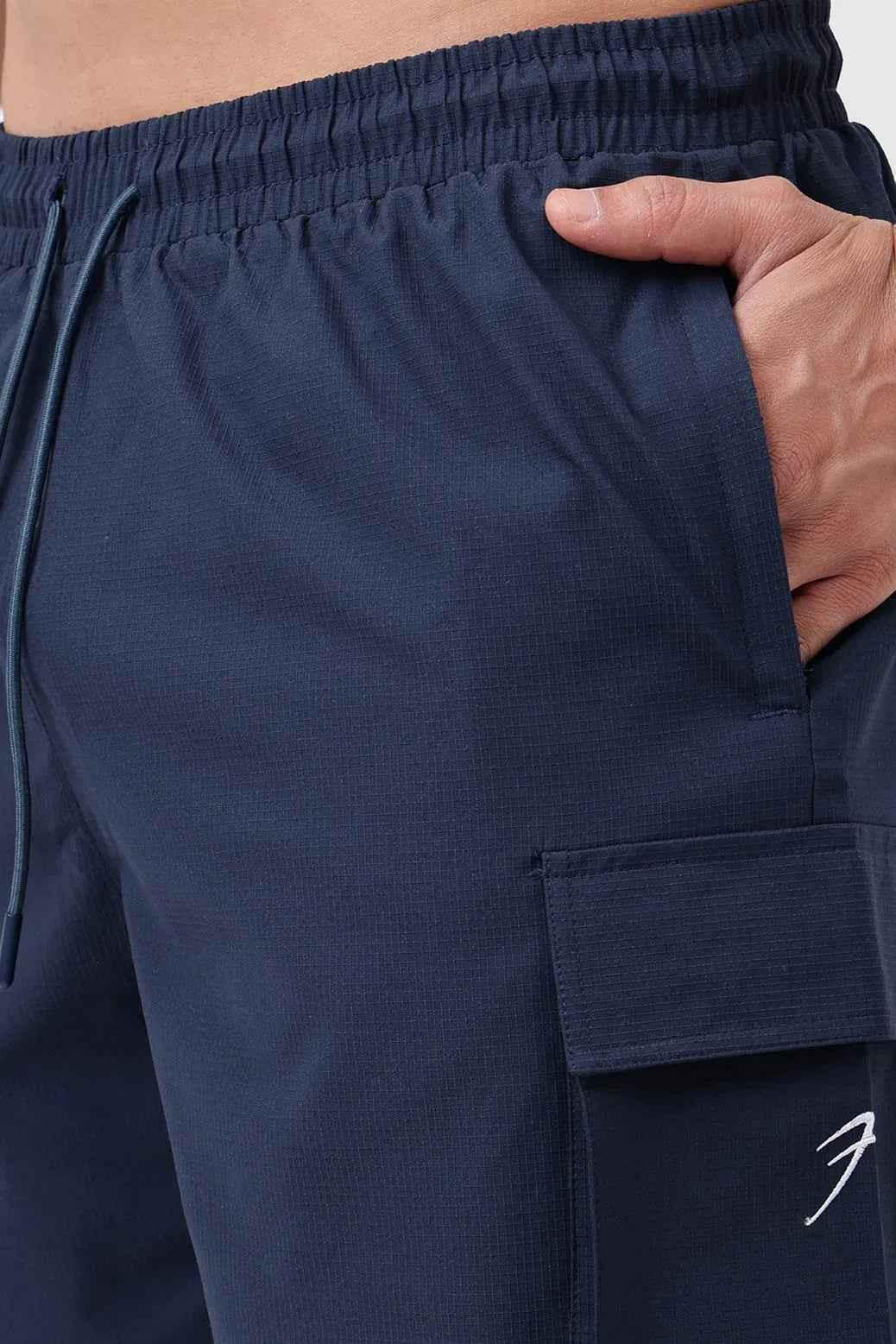 Fuaark Nz Delta Cargo Shorts in navy color, casual men's shorts with multiple pockets and comfortable fit.