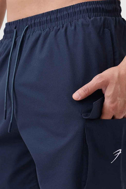 Fuaark NZ Delta Cargo Shorts in navy color, casual men's shorts with multiple pockets and comfortable fit.