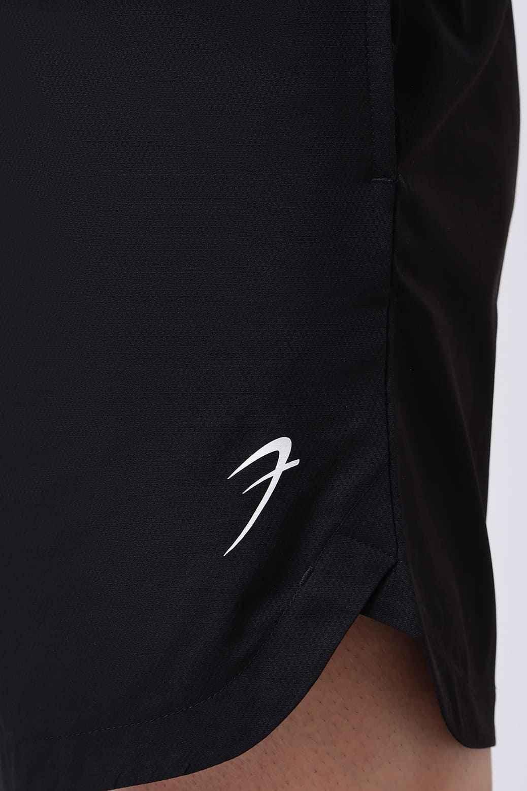Black Edge Shorts by Fuaark Nz featuring a sleek design and comfortable fit, shown on a model.