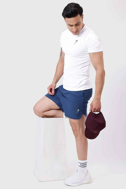 Fuaark NZ Edge Shorts in teal color, lightweight casual shorts with a relaxed fit, suitable for active or leisure wear.