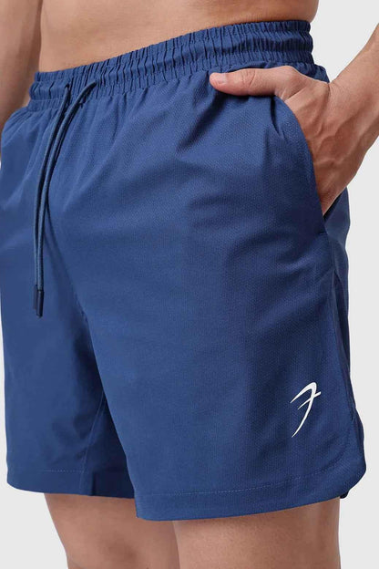 Fuaark NZ Edge Shorts in teal color, casual men's shorts with a relaxed fit and lightweight fabric for comfortable wear.