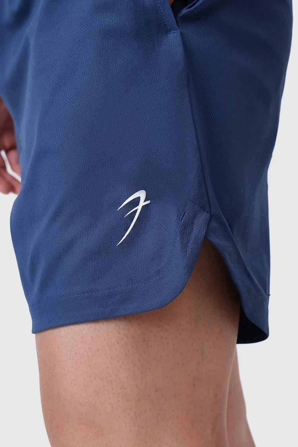 Fuaark Nz Edge Shorts in teal color, casual men's shorts with a comfortable fit and stylish design.