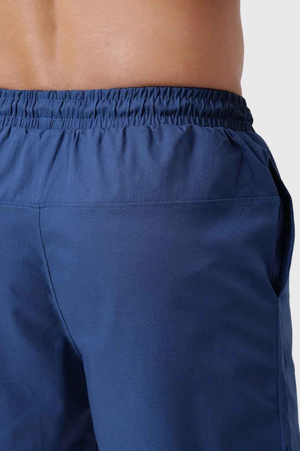 Fuaark NZ Edge Shorts in teal color, casual men's shorts with a relaxed fit and adjustable waistband, suitable for outdoor activities.