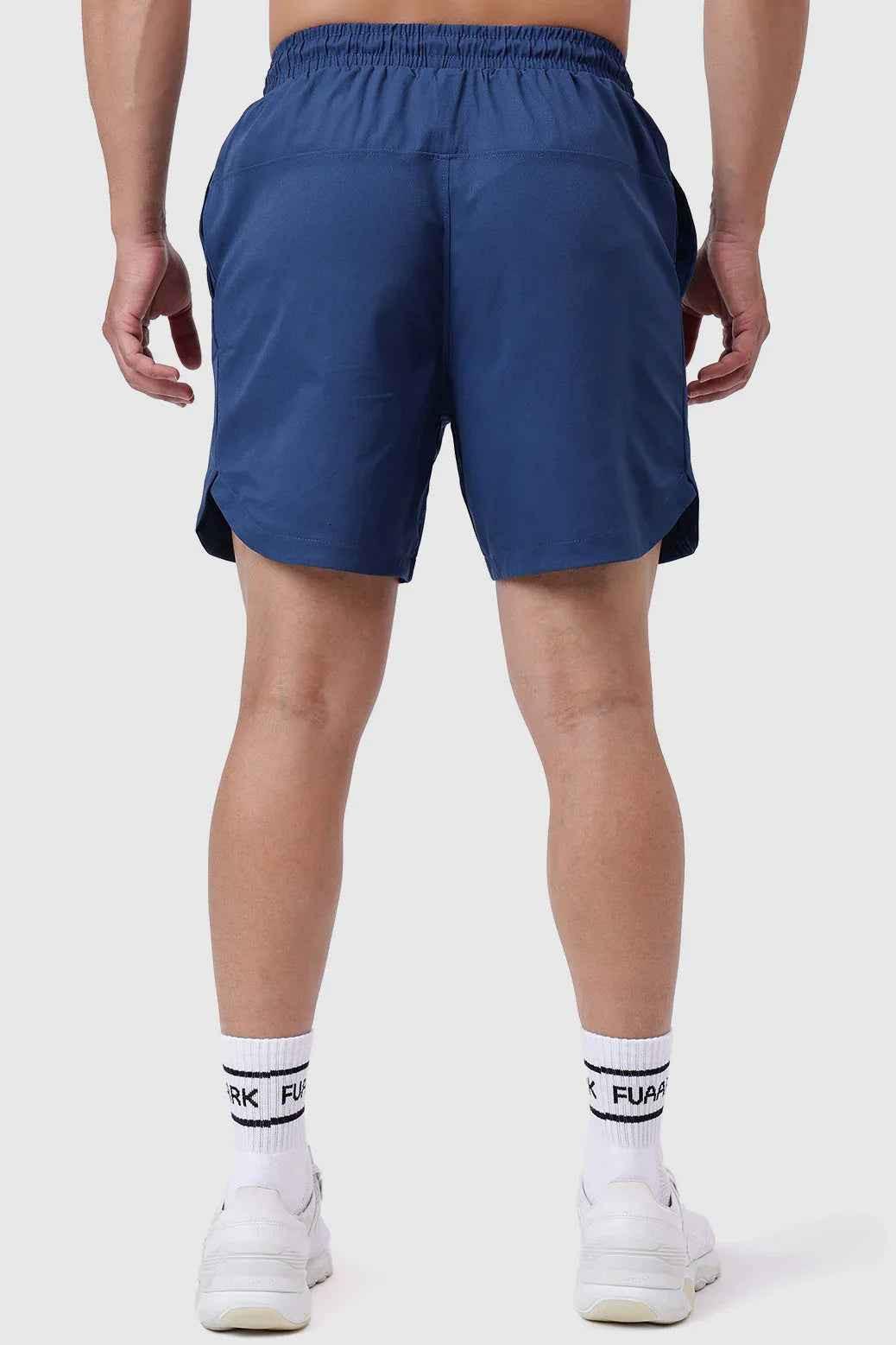 Teal Fuaark Nz Edge Shorts displayed on a model, showing the casual fit and lightweight fabric for active wear.