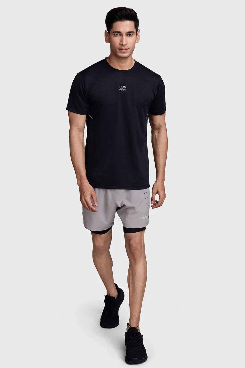 Men's 2-in-1 laser shorts in beige and black by Fuaark NZ, designed for active workouts and athletic performance.