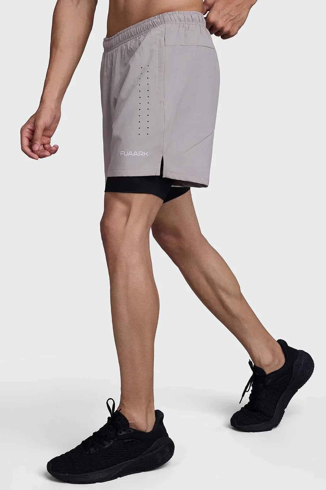 Fuaark Nz men's 2-in-1 laser shorts in beige and black, designed for active workouts and athletic performance.