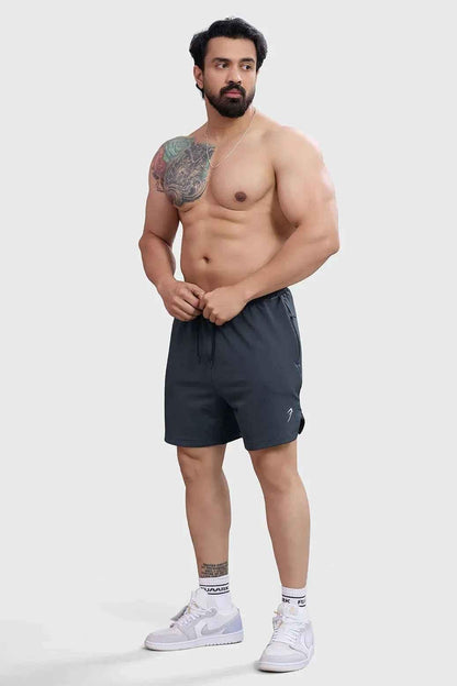 Dark grey Rush shorts by Fuaark Nz, designed for comfort, shown on a model with a relaxed fit and casual style.