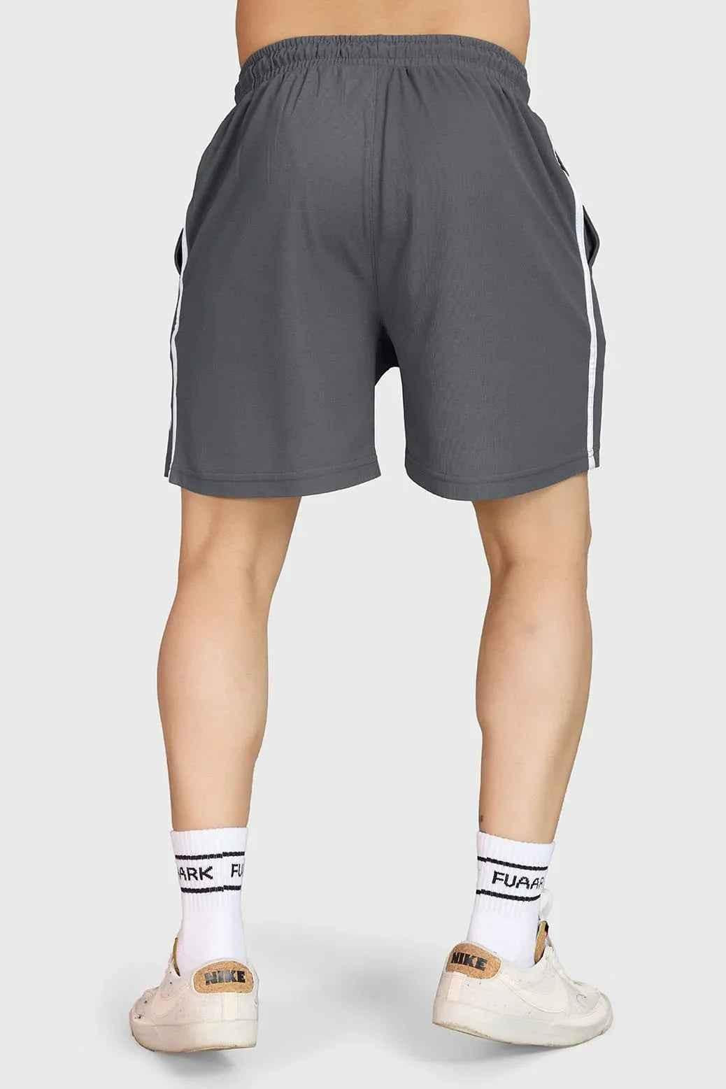 Fuaark NZ Grit Shorts in grey, showcasing casual fit and durable fabric, suitable for outdoor or everyday wear.